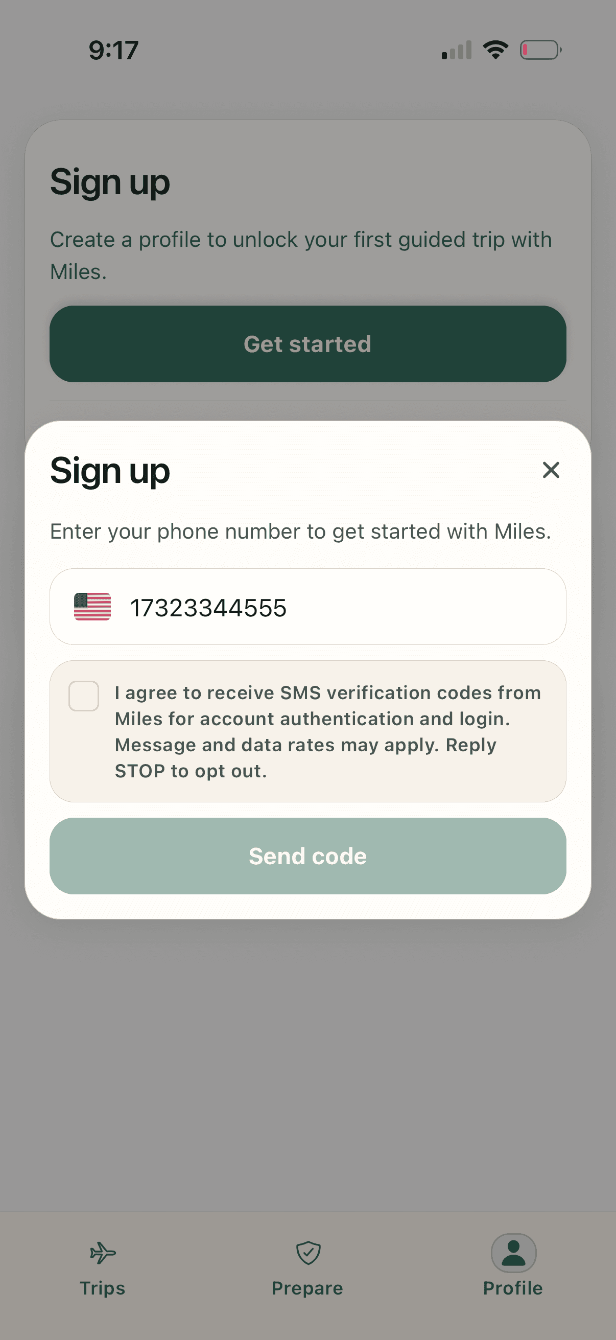 Miles sign-up screen showing an unchecked SMS verification consent checkbox before sending a code.